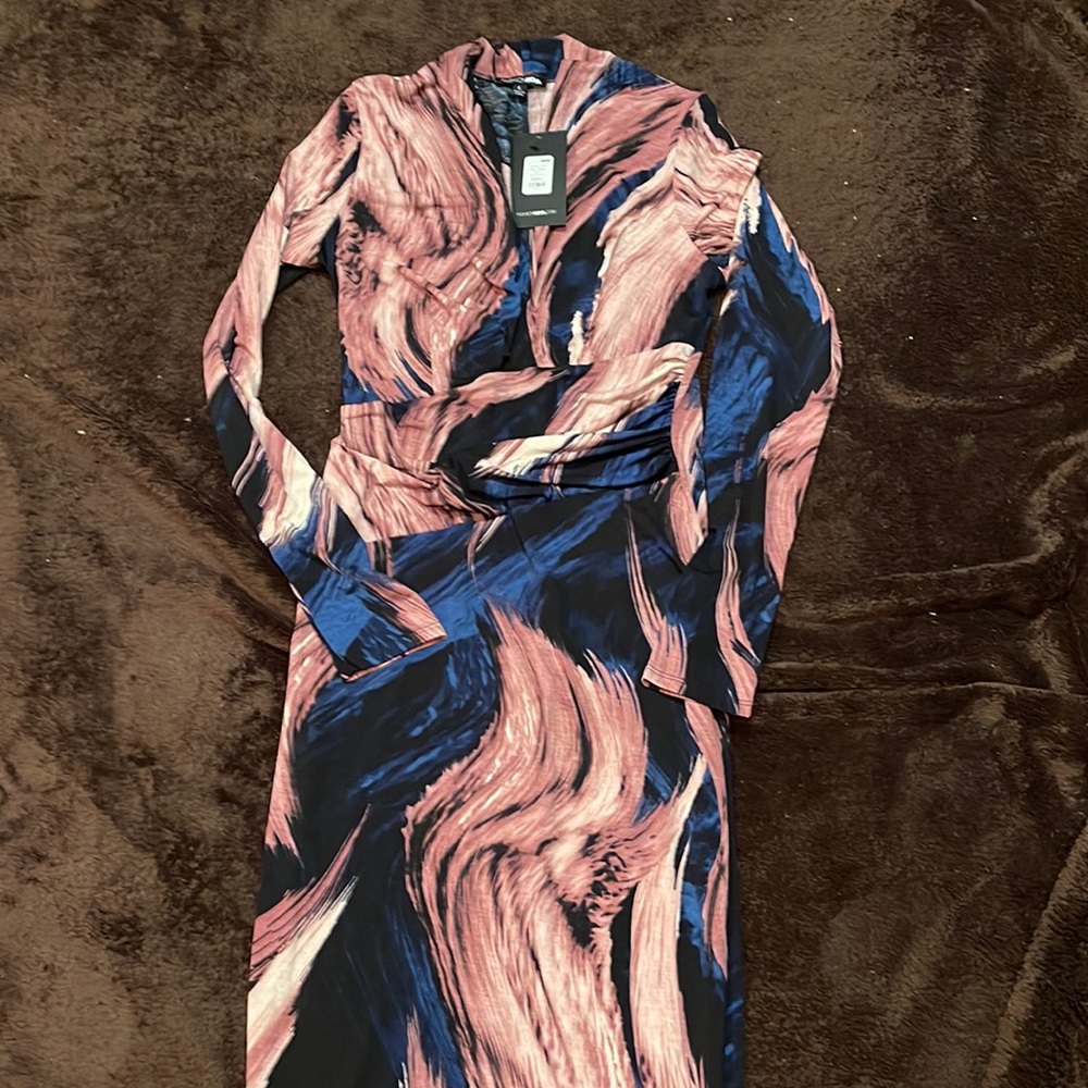 Navy blue pink swirl slit front spandex dress. New with tags size large.